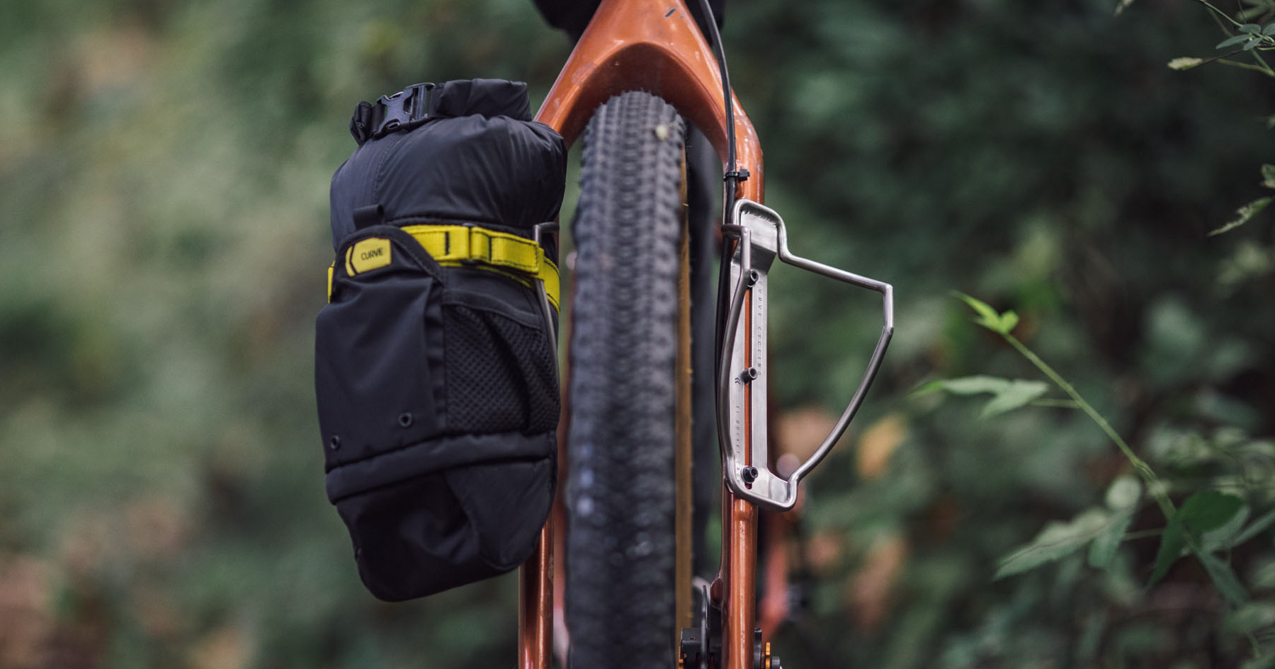 Curve Cycling Rocket Pooch and Titanium Cage (First Look) - BIKEPACKING.com