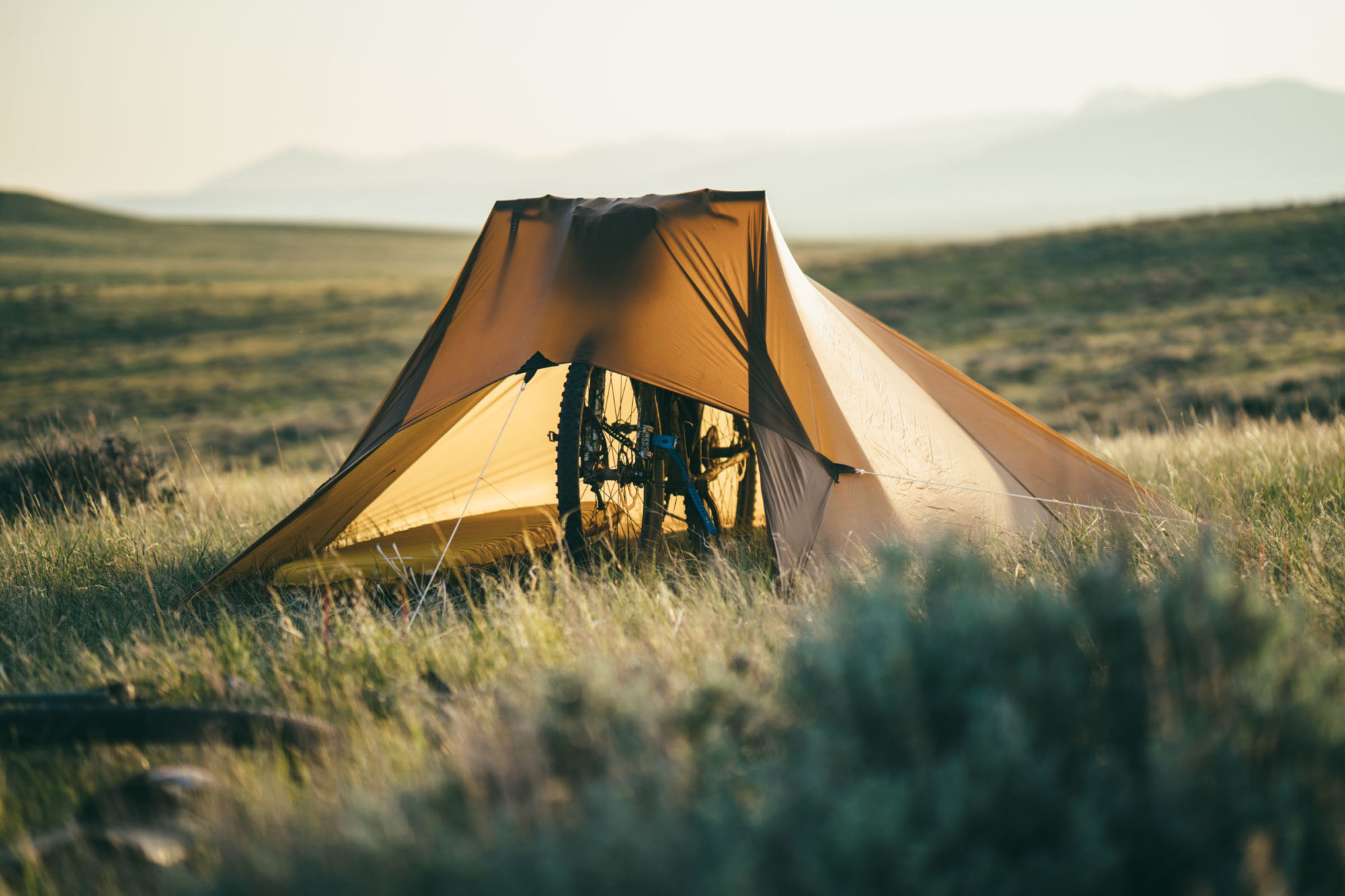 Set Up a Tarp Shelter Using Your Bike (Video)