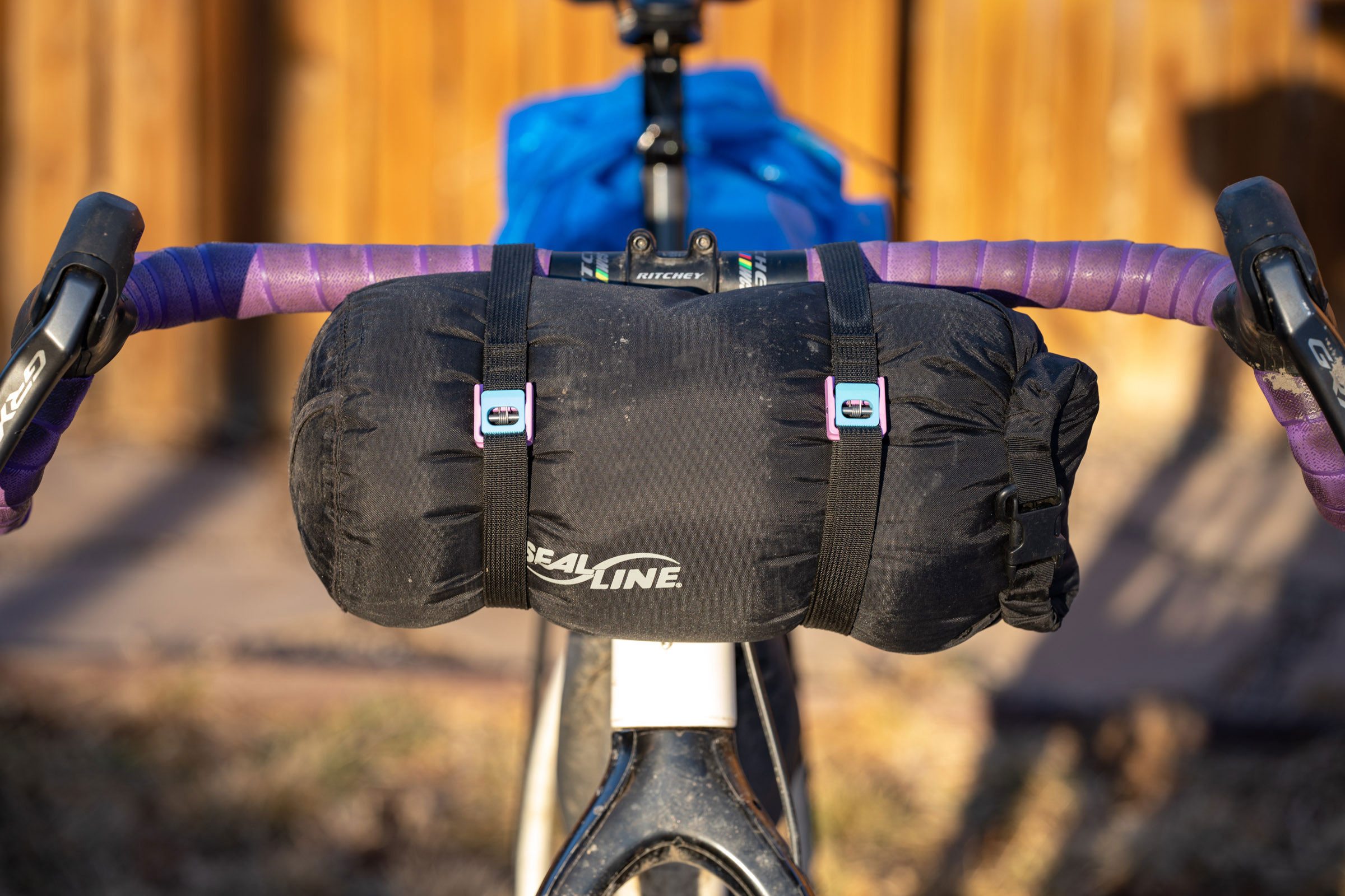 Bikepacking handlebar outlet