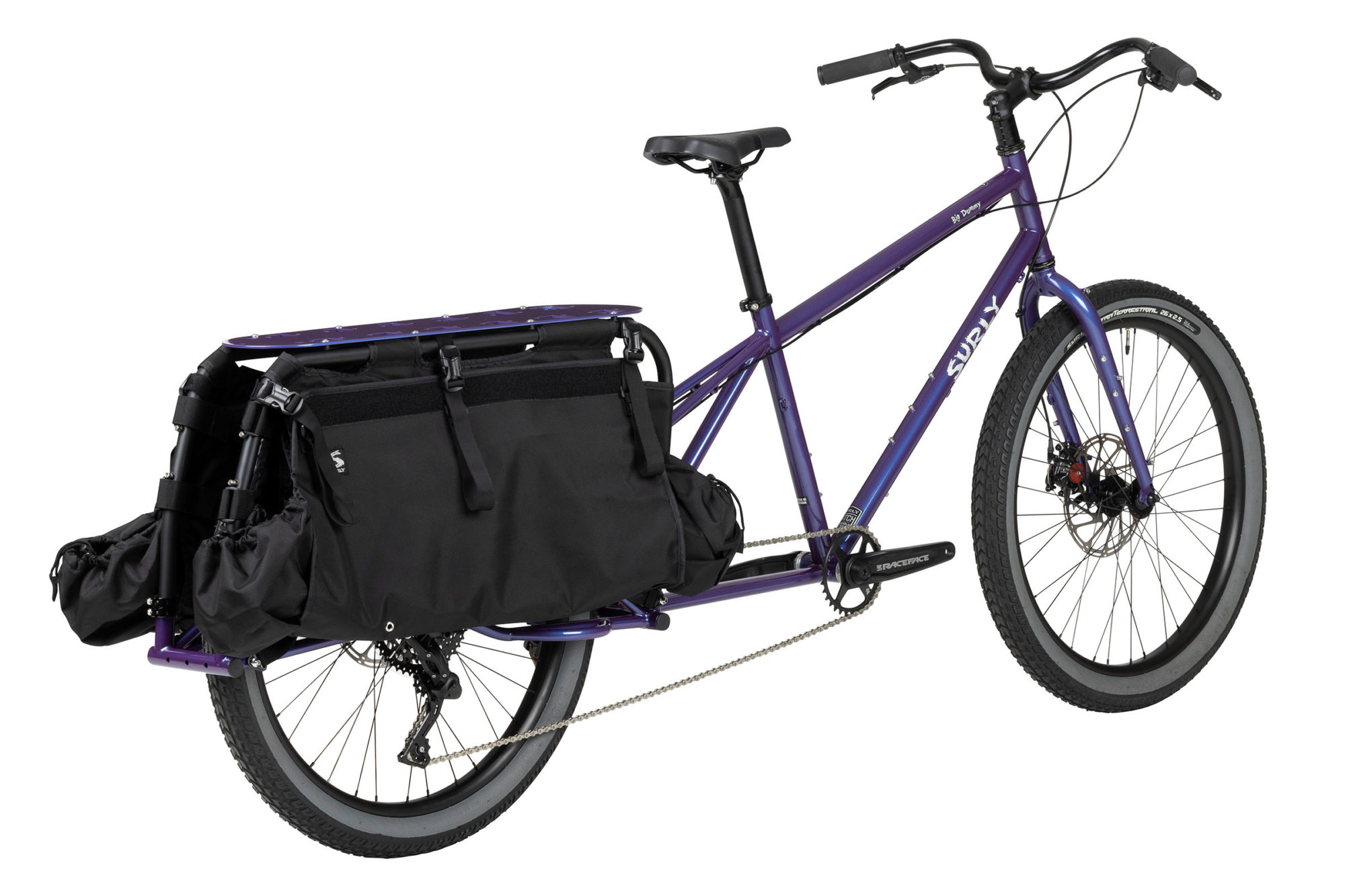 A person riding a Surly Big Dummy bike, symbolizing the journey through grief